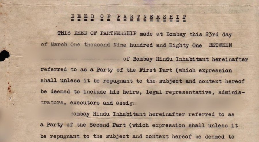 Typewritten body text of a 1981 partnership deed, faded and
                    foxed, with the party names blurred out
